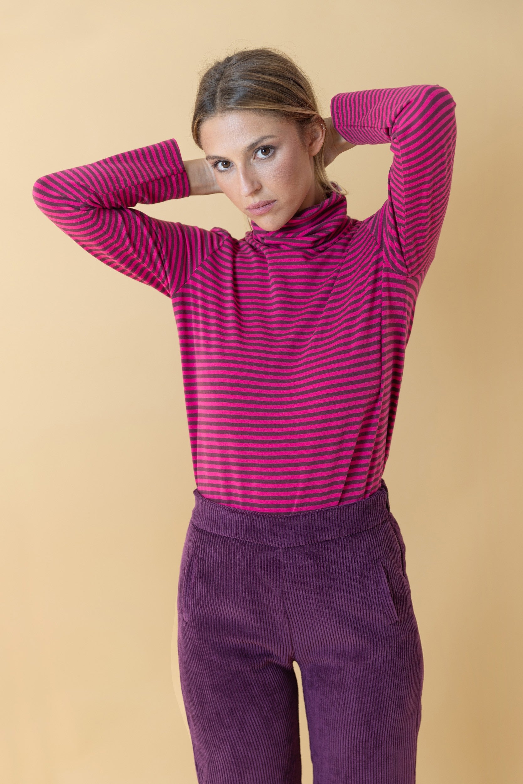 TOP RAYÉ ROSE COL TOURNÉ
